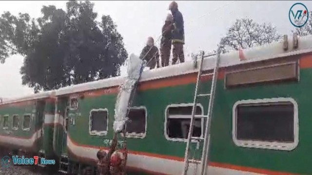 In the photo, fire-fighter's are seen recovering the passenger's body from the Kurigram Express roof.