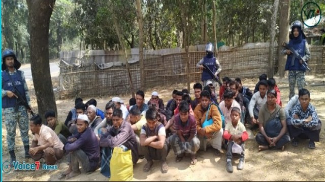 Photographed at a locals college field are forty-four Rohingya refugees who had been held by APBN.