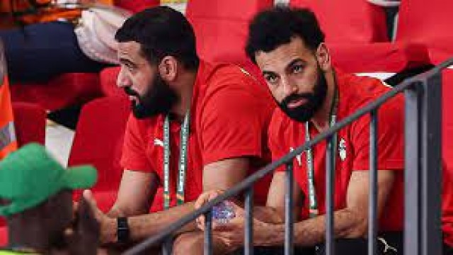 Salah, injured, takes a jab at detractors by pledging his "love" for Egypt.