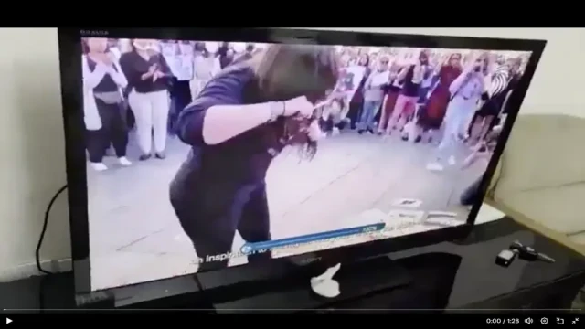 A still image from Iranian state TV shows a moment of disruption, during which an anonymous message urged citizens to “rise up” against the regime. Authorities later blamed hostile satellite interference.