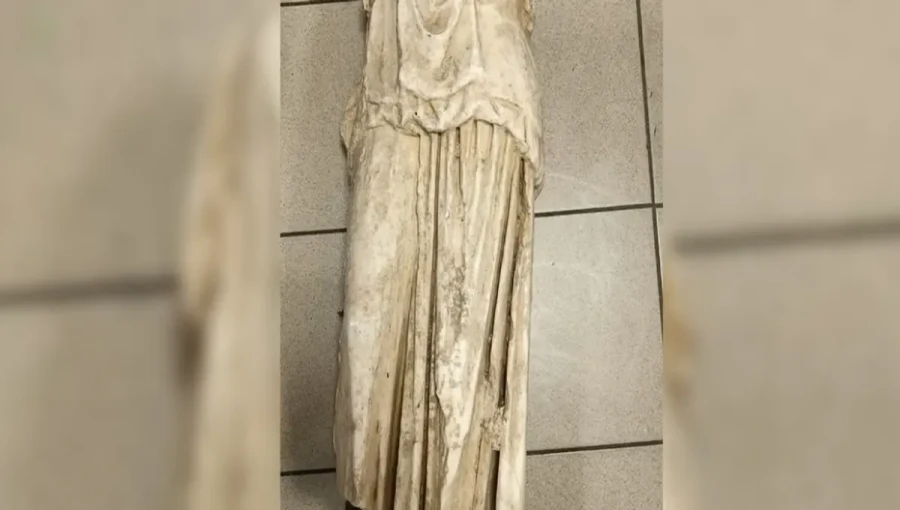 A 2,000-year-old headless statue was found discarded near trash cans in Thessaloniki, Greece, sparking a police investigation.