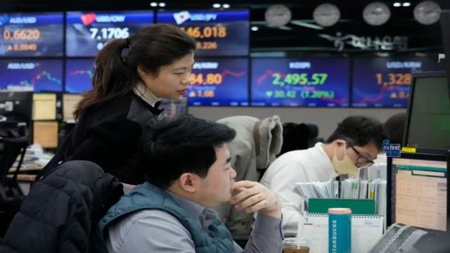 Asian markets follow Wall Street's upward trend in technology