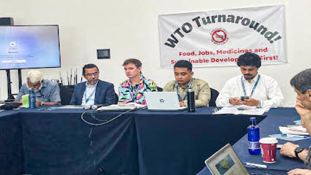 NGOs protest mistreatment during the WTO meeting in Abu Dhabi.