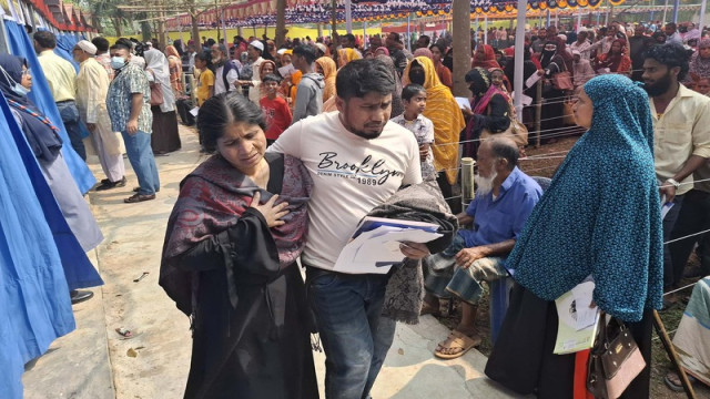 "People receiving free medical care at the camp in Tangail on International Mother Language Day."