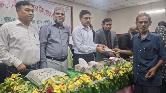Clients receive long-pending deposit refunds from defunct NGO SDS during a distribution event in Tangail, over two decades after their initial savings. (Photo: V7N)