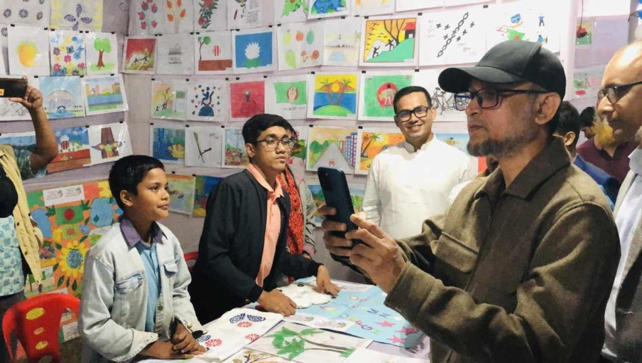 Advisor Mustafa Sarwar Farooki delivering his speech at the inauguration of the Cox’s Bazar District Book Fair, emphasizing the importance of unity and cultural heritage.