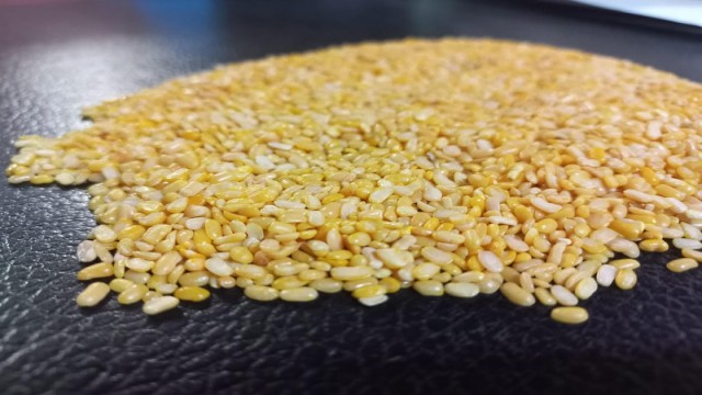 Imported Indian Moth Dal Adulterated with Harmful Chemicals Being Inspected at Rajshahi Land Port, Posing Serious Health Risks in Bangladesh.