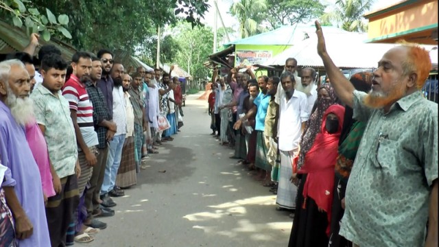Residents Protest Overcharging in Jhalokathi Food-Friendly Rice Distribution