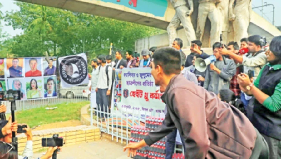 Students at Dhaka University throw shoes and paint at portraits of Chhatra League leaders during a "Hate Throw" protest to express their opposition to the student organization, marking its 77th anniversary.