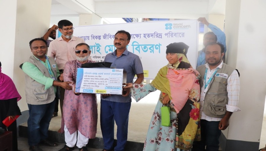 Women receive sewing machines as part of cyclone Remal rehabilitation efforts in Kalapara, Patuakhali. Photo: Voice7 News