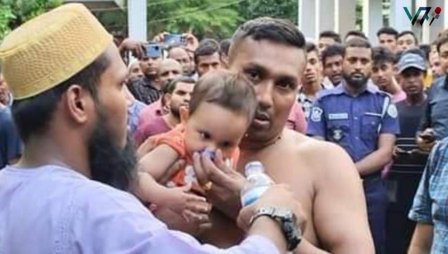 He doesn't know what has happened! Who is there and who is not! The 8-month-old child who survived the Barguna tragedy gazes up at his father with unblinking eyes. Photo: Voice7 news
