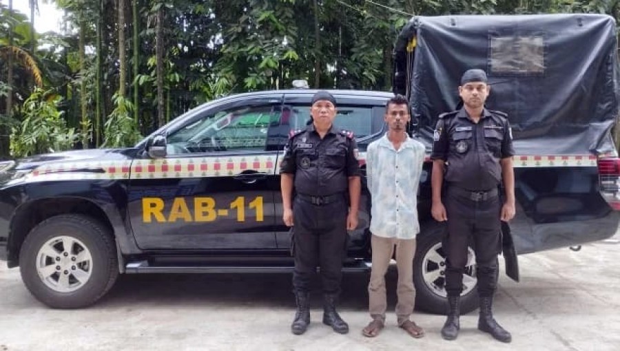 RAB Arrests Armed Terrorist with Large Cache in Noakhali