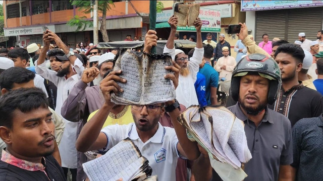 Leaders accuse BNP activists of arson and desecration, demand removal of local police official for alleged bias.