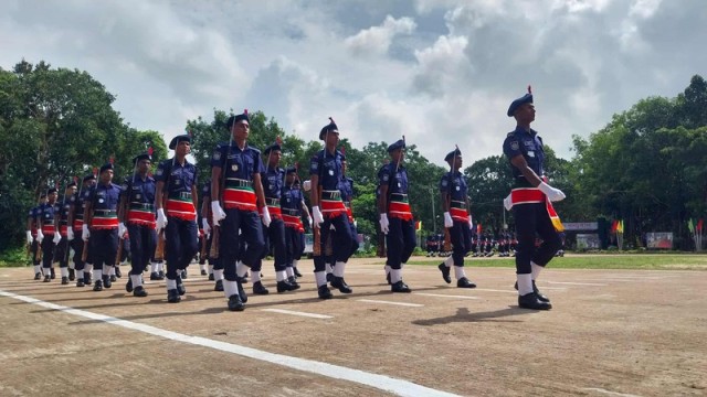 Additional Inspector General of Police AKM Awlad Hossain receives the salute during the passing-out parade of the 11th batch of trainee constables at the Khagrachhari APBn & Specialized Training Centre on Sunday. (Photo: BT/V7N)