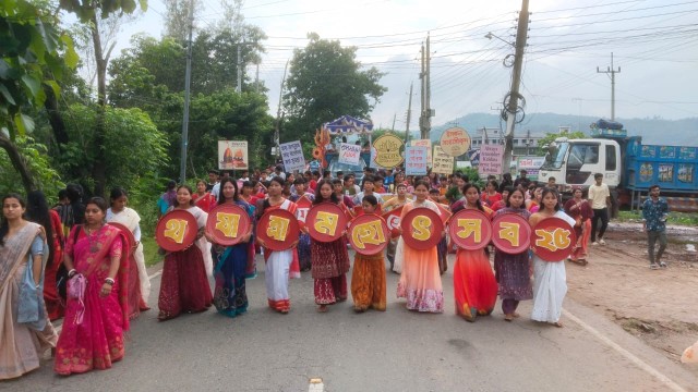 Women and children enthusiastically participate in the age-old Rath Yatra procession, celebrating unity and devotion.
