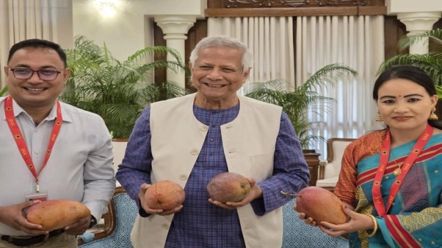 Khagrachari Hill District Council Chairperson Jiruna Tripura presents a basket of indigenous hill fruits to Chief Advisor Professor Dr. Muhammad Yunus during a courtesy visit at his residence in Dhaka.