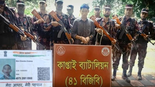 In the picture, Border Guard Bangladesh (BGB) personnel display an Indian citizen alongside his Aadhaar card following his arrest near the Rangamati border area.