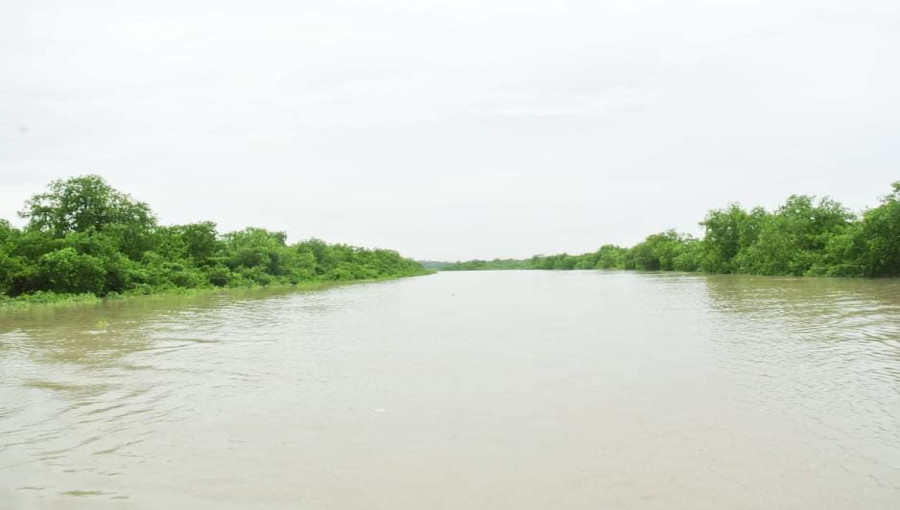 Tourists enjoying the serene beauty of Shailer Char, a scenic river island in Kathalia, Jhalkathi, now developed with an eco-park and resting facilities.