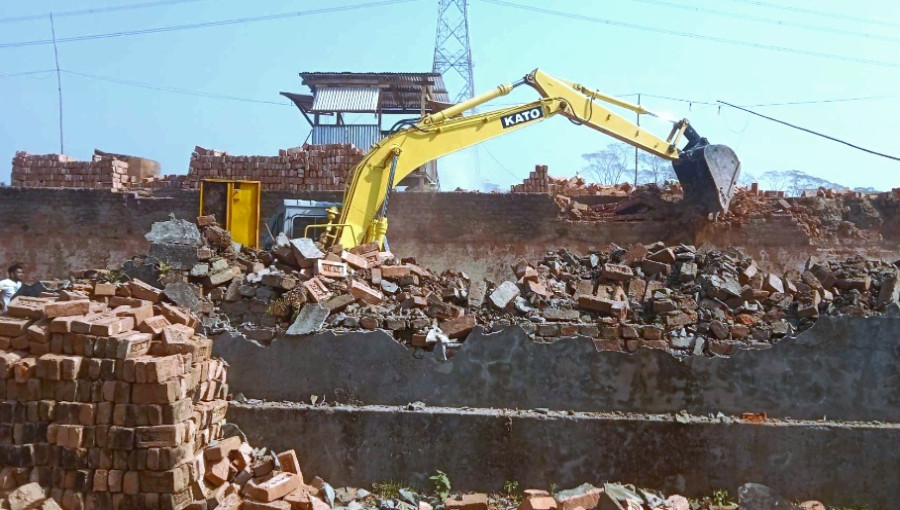 Environmental officials demolish an illegal brick kiln near Sorai Government Primary School in Nalkathi, Jhalokathi, on December 29, 2024. The operation was carried out after complaints from local residents and school authorities.